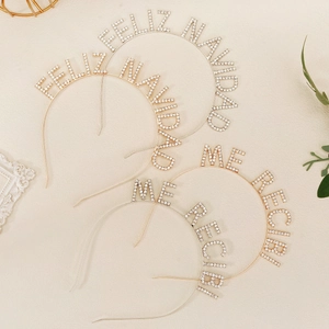 Sparkling rhinestone metal headbands featuring Feliz Navidad and Me Recibi lettering set