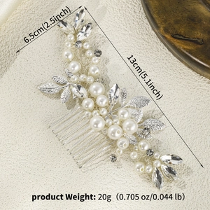 Detail of bridal hair comb with pearls and rhinestones measuring 13cm by 6.5cm