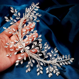 Luxurious bridal headband with silver leaf vine and sparkling rhinestones for weddings