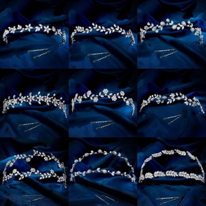 Set aus neun eleganten Braut-Haarreifen und Kronen mit Zirkonia auf blauer Seide