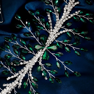 Detail of luxury bridal headband with green marquise stones and crystals on silver wire