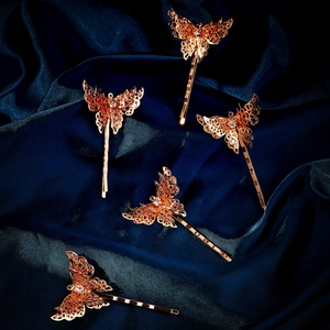 5-piece set of rose gold butterfly hair clips with hollow filigree and rhinestones