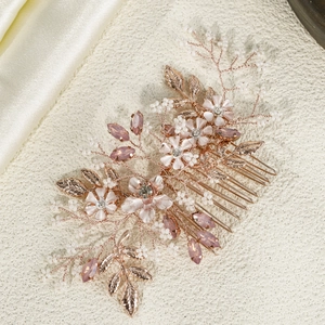 Peigne à cheveux avec pierres roses et perles blanches pour coiffure de mariée en or rose