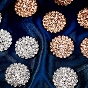 Sparkling crystal rhinestone flower button accessories in silver and rose gold finishes