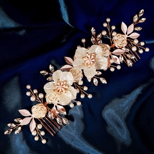 Handmade bridal hair comb with white acrylic flowers and pearls on rose gold metal