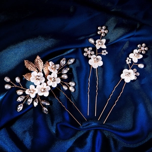 Lot de trois épingles à cheveux de mariée avec fleurs en argile et feuilles dorées