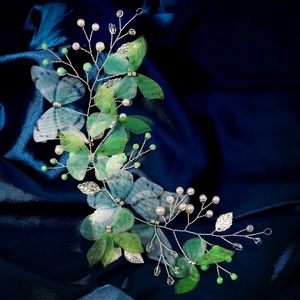 Detailed close-up of handmade bridal headband with blue mesh butterflies and pearls