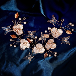 Handmade bridal headband with gold metal wire flowers, resin butterflies and white pearls