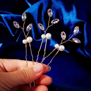 Lot de trois épingles à cheveux dorées avec cristaux marquise et perles blanches