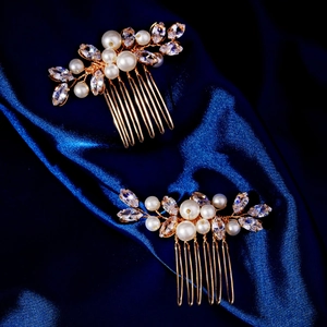 Elegant gold bridal hair combs with white pearls and crystals for wedding hairstyles