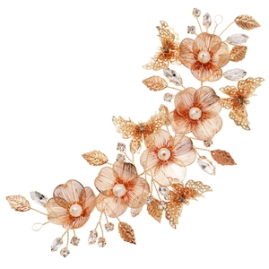 Luxury gold bridal headband with hollow flowers, butterfly motifs and pearl accents