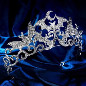 Macro shot of silver gothic bat crown with clear rhinestones for Halloween parties