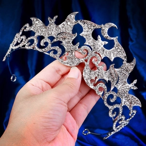 Gothic bat-shaped crown with sparkling rhinestones and intricate silver metal details
