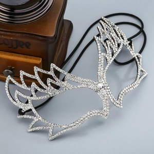Luxurious silver masquerade mask with sparkling rhinestones in an elegant wing shape