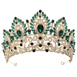Luxurious gold alloy bridal crown with emerald crystals and sparkling rhinestones