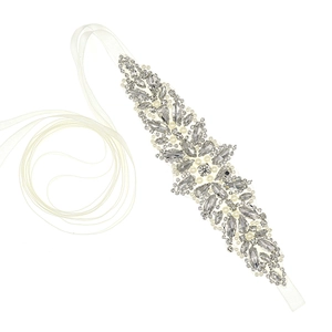 Exquisite bridal sash with crystal floral patterns and elegant white organza ribbon ties
