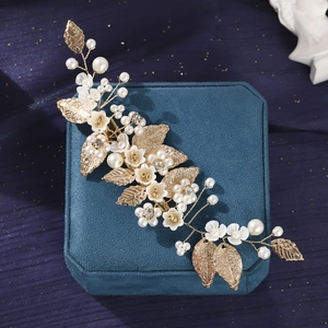 Handmade golden bridal hair clip with white flowers, pearls and vintage leaves