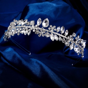 Detailed macro view of handcrafted silver bridal headband with marquise and pear crystals