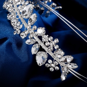 Close-up of bridal headband with sparkling marquise and pear-cut floral rhinestones