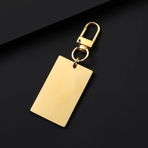Golden rectangular stainless steel keychain with matte brushed finish and lobster clasp