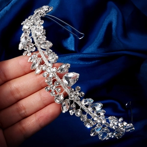 Sparkling crystal bridal headband with marquise and teardrop stones on silver vine base