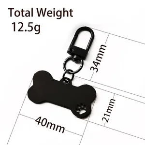 Bone-shaped black metal pet ID tag with paw cut-out and D-ring spring clasp for dogs