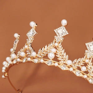 Golden crown tiara with leaf-shaped alloy, white pearls, and sparkling rhinestones
