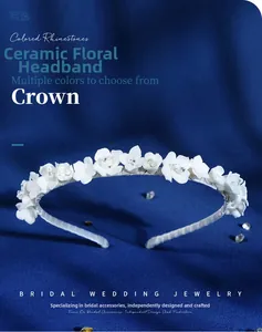 Detail shot of handcrafted white ceramic flowers with sparkling rhinestones on a bridal headband