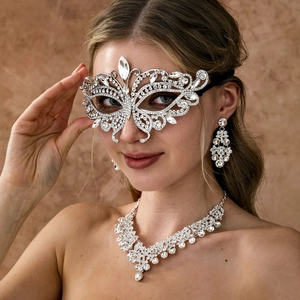 Close-up of luxury rhinestone mask with matching V-shape necklace and drop earrings set