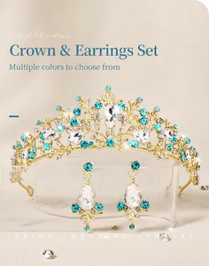 Detail of a vintage golden bridal tiara and earrings set with light blue crystals