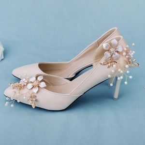 Elegant nude pink pointed high heels with 3D floral petals, gold leaves and pearls