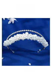 Detailed shot of double-layer faux pearl headband with sparkling crystal rhinestones