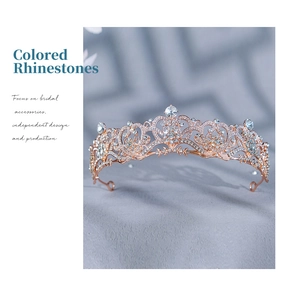 Detailed macro view of baroque bridal crown with rose gold plating and blue rhinestones