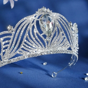 Luxurious bridal tiara with sparkling rhinestones and a teardrop crystal centerpiece