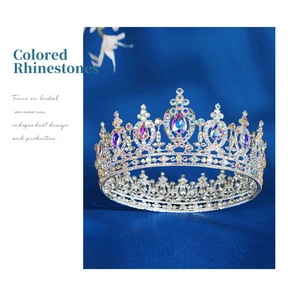 Macro detail of luxury bridal crown featuring vibrant AB rhinestones and silver alloy base
