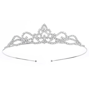 Detailed view of silver bridal tiara with intricate rhinestone clusters and flexible frame