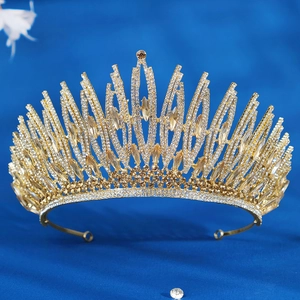 Luxurious bridal tiara with champagne rhinestones on a gold setting for weddings