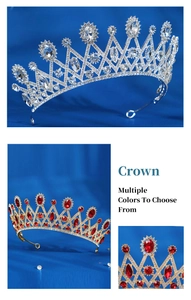 Detail view of luxury crystal bridal crowns in silver and gold on a blue fabric