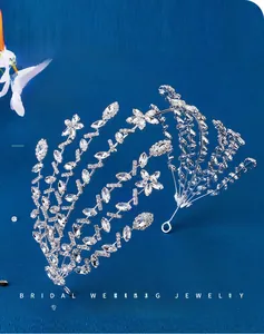 Close-up of luxury bridal headband with silver leaves and sparkling white rhinestones