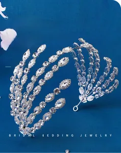 Macro detail of luxury silver leaf bridal headband with sparkling marquis cut rhinestones