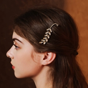 Elegant gold leaf wheat ear hair clip with sparkling rhinestones for retro styling