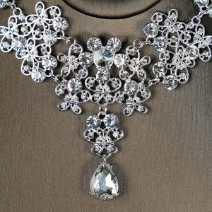 Silver vintage bridal necklace with floral hollow design and large water drop crystal pendant