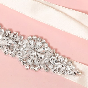 Elegant bridal belt with sparkling rhinestones on pink lace and cream satin ribbon