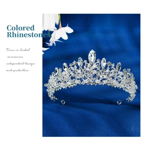 Close-up of shimmering rhinestones and silver alloy base on a bridal crown