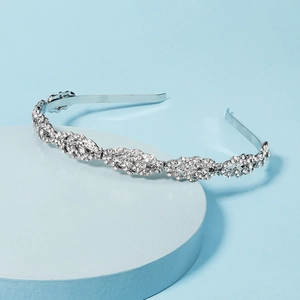 Elegant silver alloy headband with sparkling crystal leaf patterns for wedding hairstyles