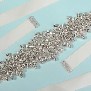 Exquisite bridal belt with hand-sewn rhinestones on white satin ribbon for wedding gowns