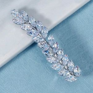 Detailed close-up of wheat leaf hair clip with marquise-cut zircon stones on silver base
