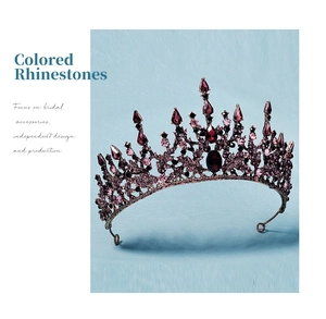 Detailed macro of vintage bronze bridal tiara with colorful purple and red rhinestones