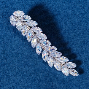 Elegant silver wheat ear hair clip with marquise cut zircons on a dark background