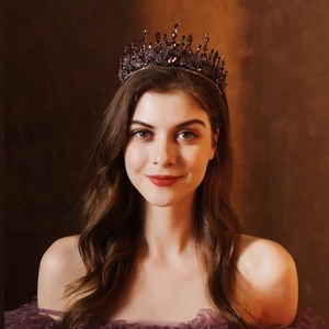 Baroque bridal crown in vintage bronze with deep purple rhinestones on female model
